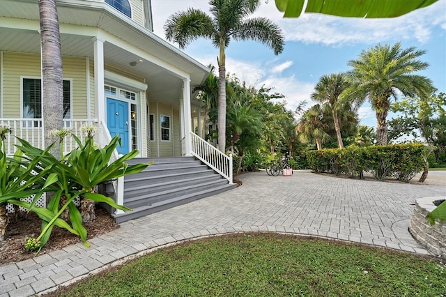 entrance to property with a porch