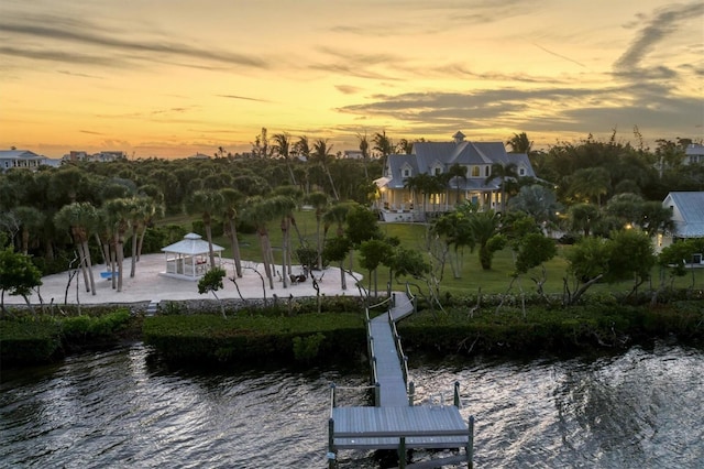 water view featuring a gazebo and a dock