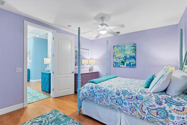 bedroom featuring ceiling fan and light hardwood / wood-style floors