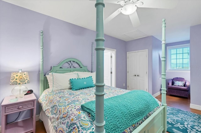 bedroom featuring a closet, ceiling fan, and hardwood / wood-style flooring