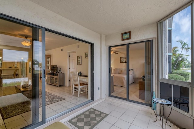 doorway to property featuring a patio area