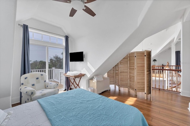 bedroom featuring hardwood / wood-style flooring, ceiling fan, and lofted ceiling