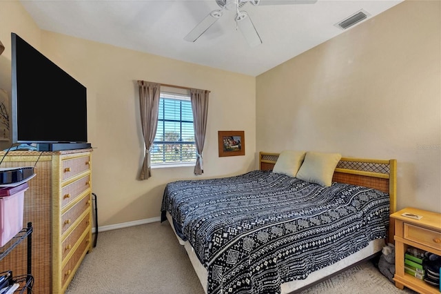 bedroom with ceiling fan and light colored carpet