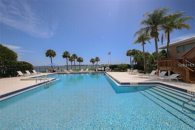 view of swimming pool featuring a patio area