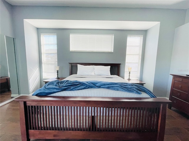 bedroom featuring multiple windows