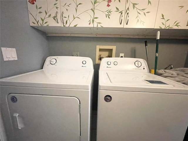 clothes washing area featuring washing machine and dryer