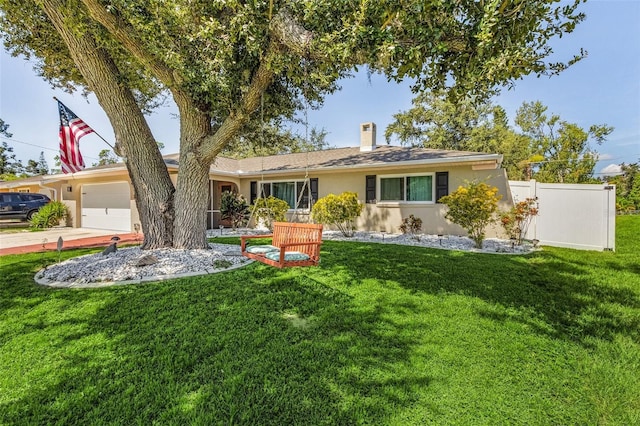 ranch-style house with a garage and a front yard