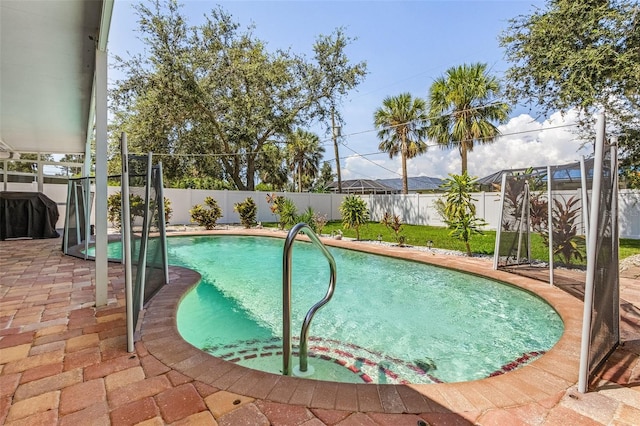 view of pool featuring a patio area