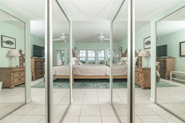 bedroom featuring tile patterned flooring and ceiling fan