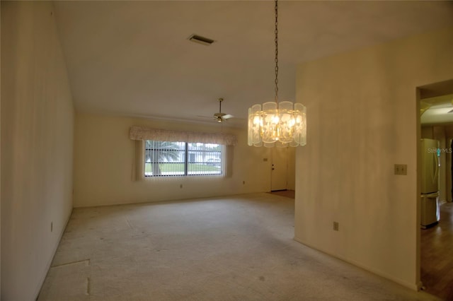 interior space with light carpet and ceiling fan with notable chandelier