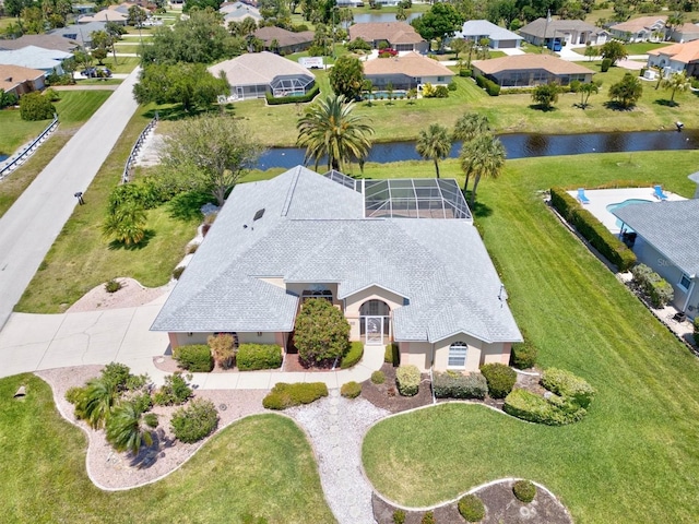 bird's eye view with a water view