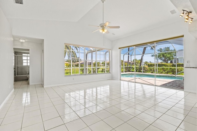 interior space featuring ceiling fan and vaulted ceiling