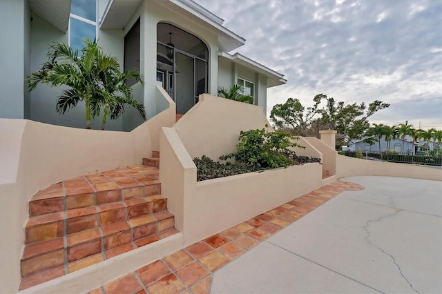 view of side of home featuring a patio