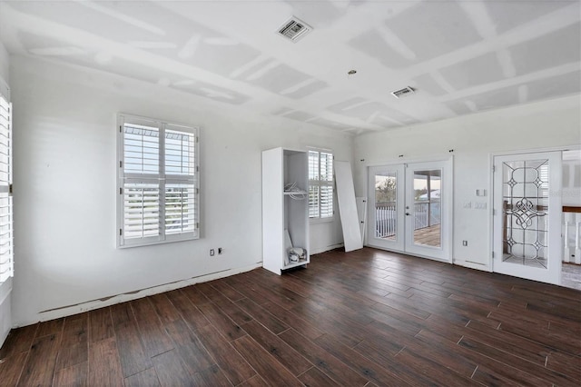 interior space with french doors, dark hardwood / wood-style floors, and plenty of natural light