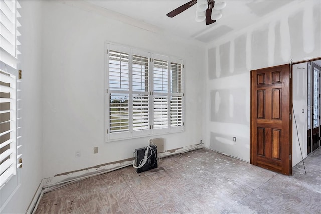 unfurnished room featuring ceiling fan