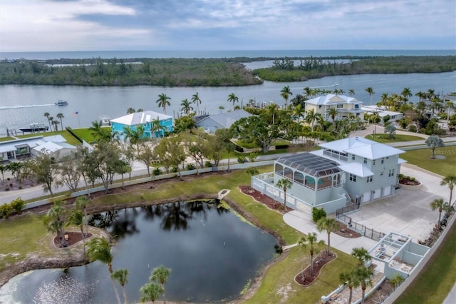 bird's eye view with a water view