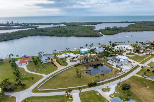 birds eye view of property featuring a water view