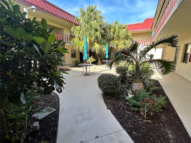 view of community with a patio