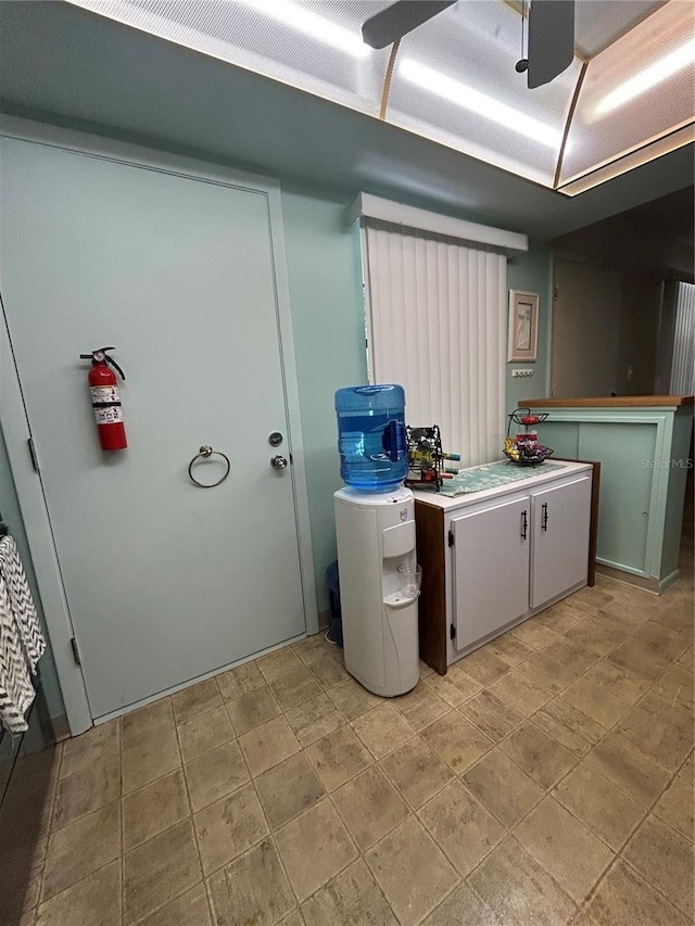 washroom with cabinets