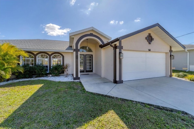 single story home featuring a front lawn and a garage