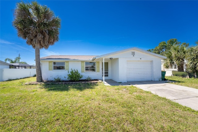 ranch-style home with a garage and a front lawn