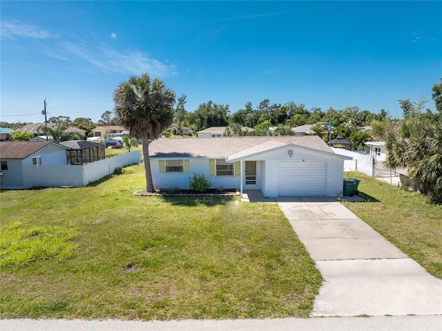 single story home with a garage and a front lawn