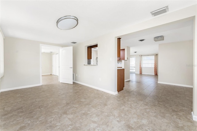 view of tiled spare room