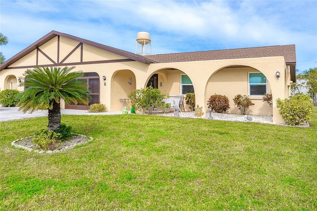 view of front of house with a front lawn