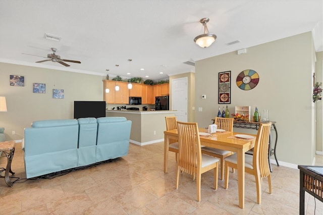 dining area with light tile flooring, ceiling fan, and crown molding