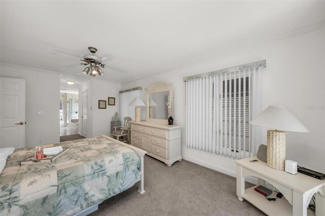 carpeted bedroom with ceiling fan, crown molding, and connected bathroom