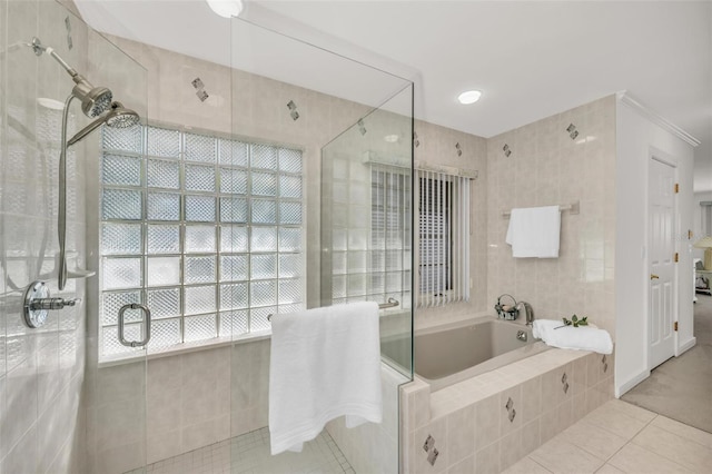 bathroom featuring separate shower and tub and tile patterned floors