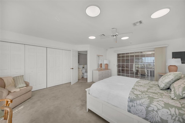 bedroom featuring ceiling fan and light colored carpet