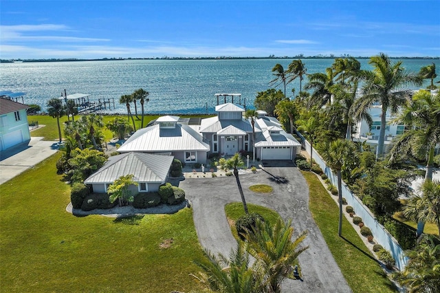 drone / aerial view with a water view