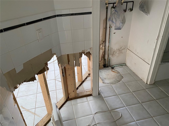 bathroom with tile patterned flooring