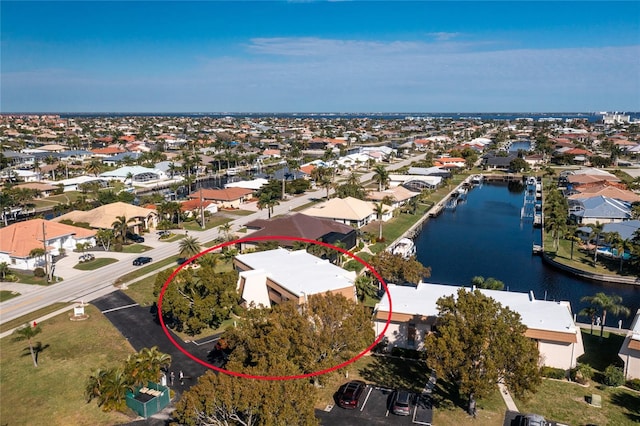 drone / aerial view with a water view