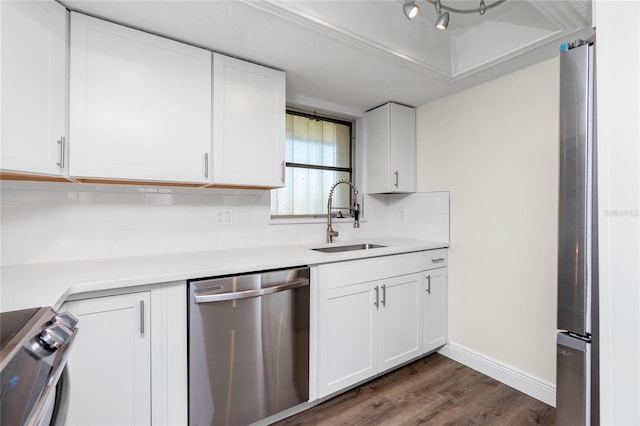 kitchen featuring white cabinetry, appliances with stainless steel finishes, and sink