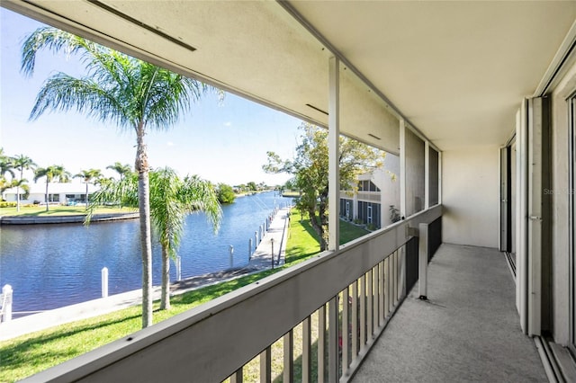 balcony featuring a water view