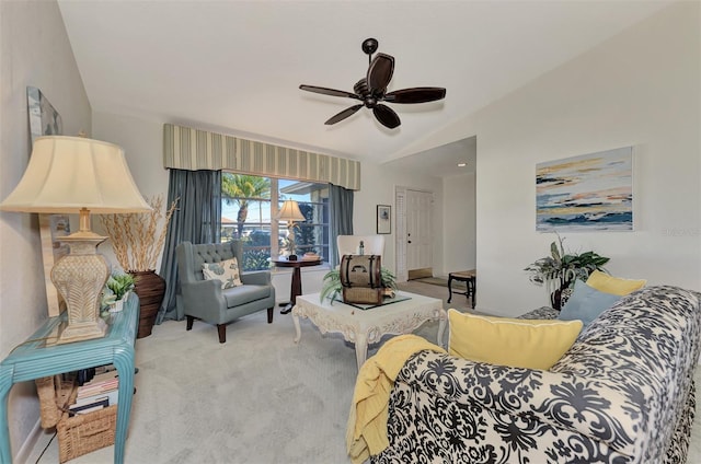 carpeted living room featuring ceiling fan