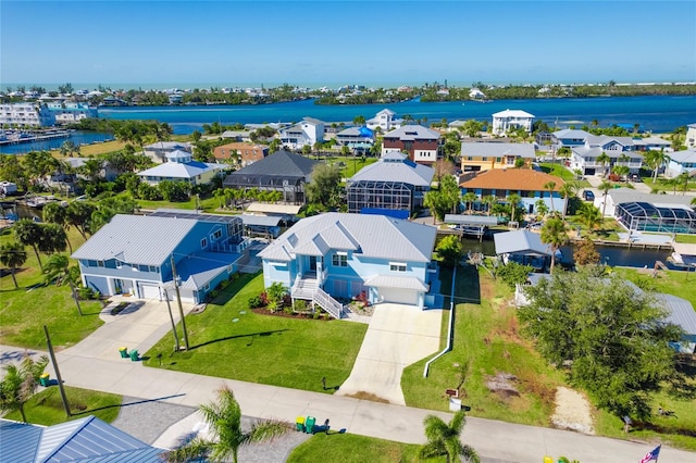 drone / aerial view with a water view