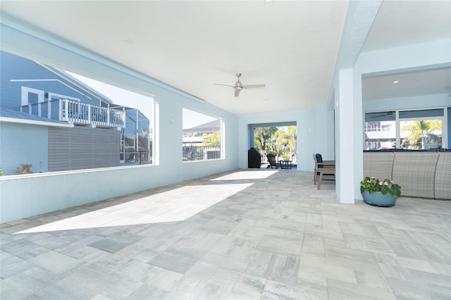 view of patio / terrace featuring ceiling fan