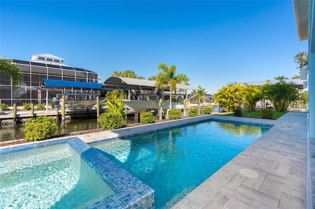 view of swimming pool featuring glass enclosure and a water view