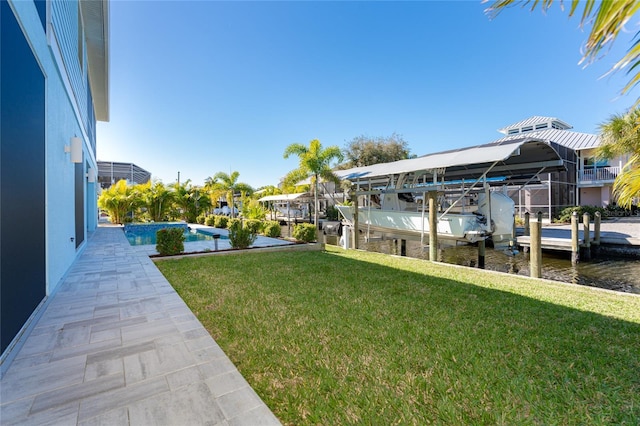 exterior space featuring a water view and a yard