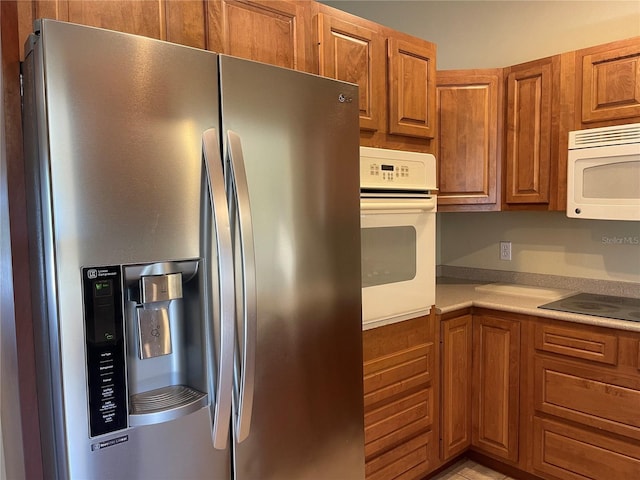 kitchen featuring white appliances