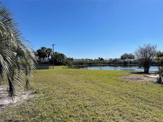 view of yard with a water view