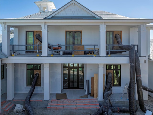 exterior space featuring a balcony