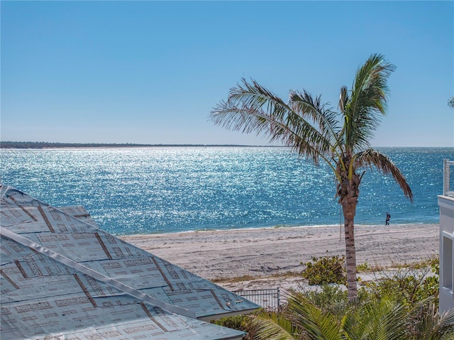 property view of water featuring a beach view