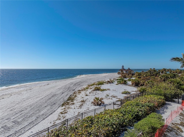 property view of water featuring a beach view