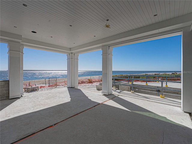 view of patio / terrace with a water view