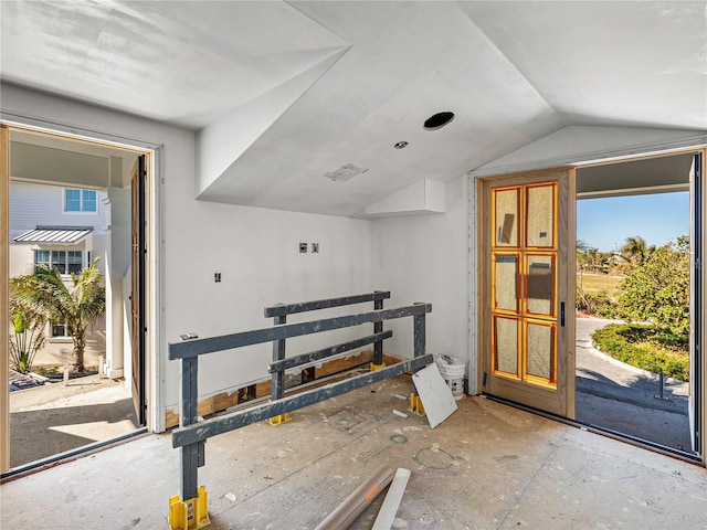 interior space featuring lofted ceiling