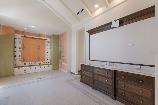 894 Hill Tide Ln, Boca Grande, FL 33921 - bathroom with vaulted ceiling and vanity